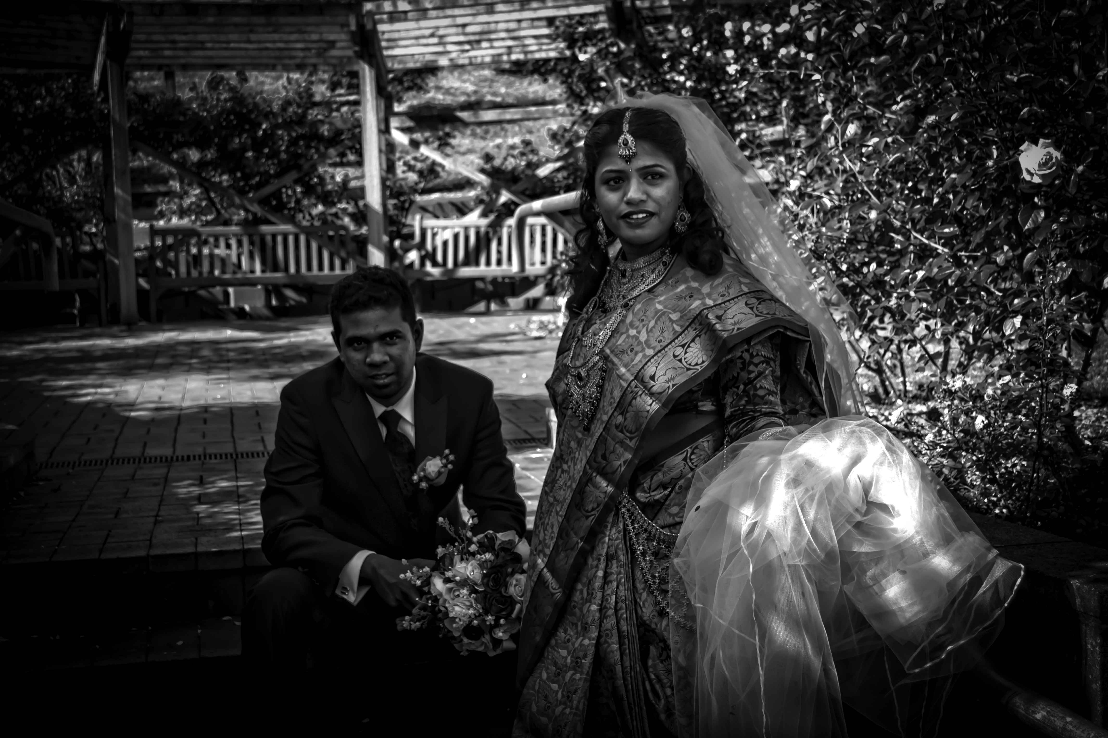 grayscale photo of bride and groom