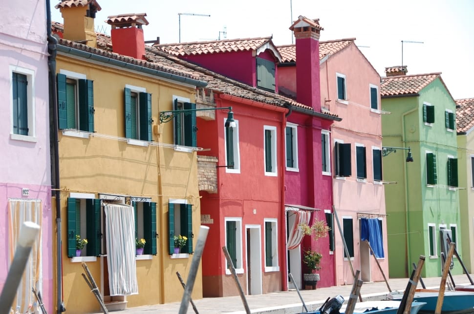 red pink and green two storey houses preview
