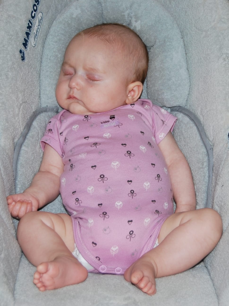 baby's pink and black floral onesie preview