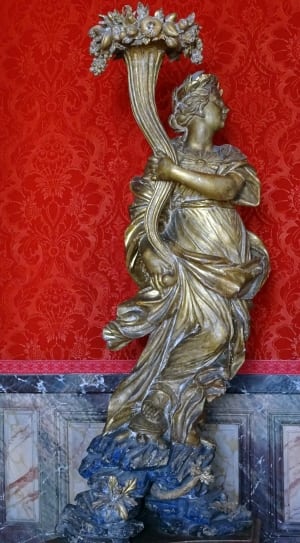 gold emboss woman statue thumbnail
