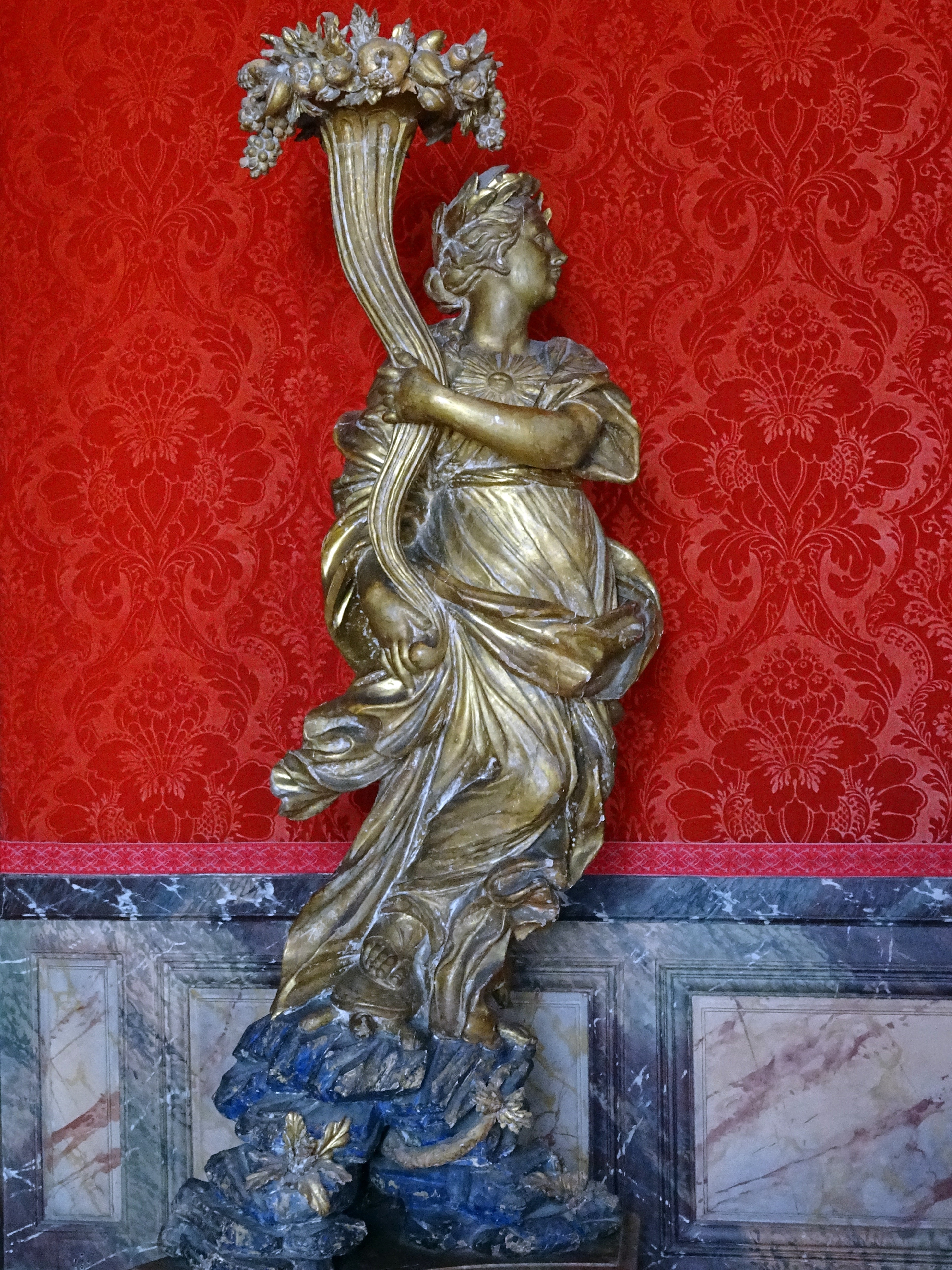 gold emboss woman statue