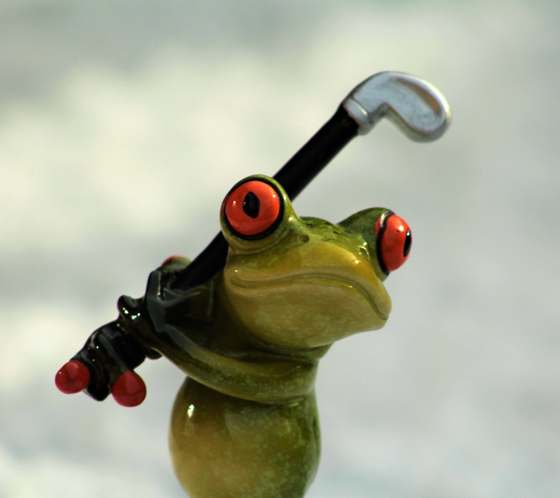 green frog ceramic figurine