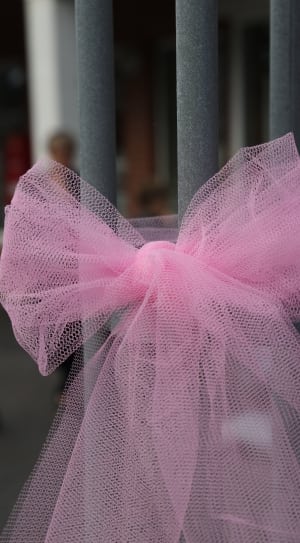 pink ribbon on grey metal thumbnail