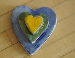 blue green and yellow heart ceramic ornament thumbnail