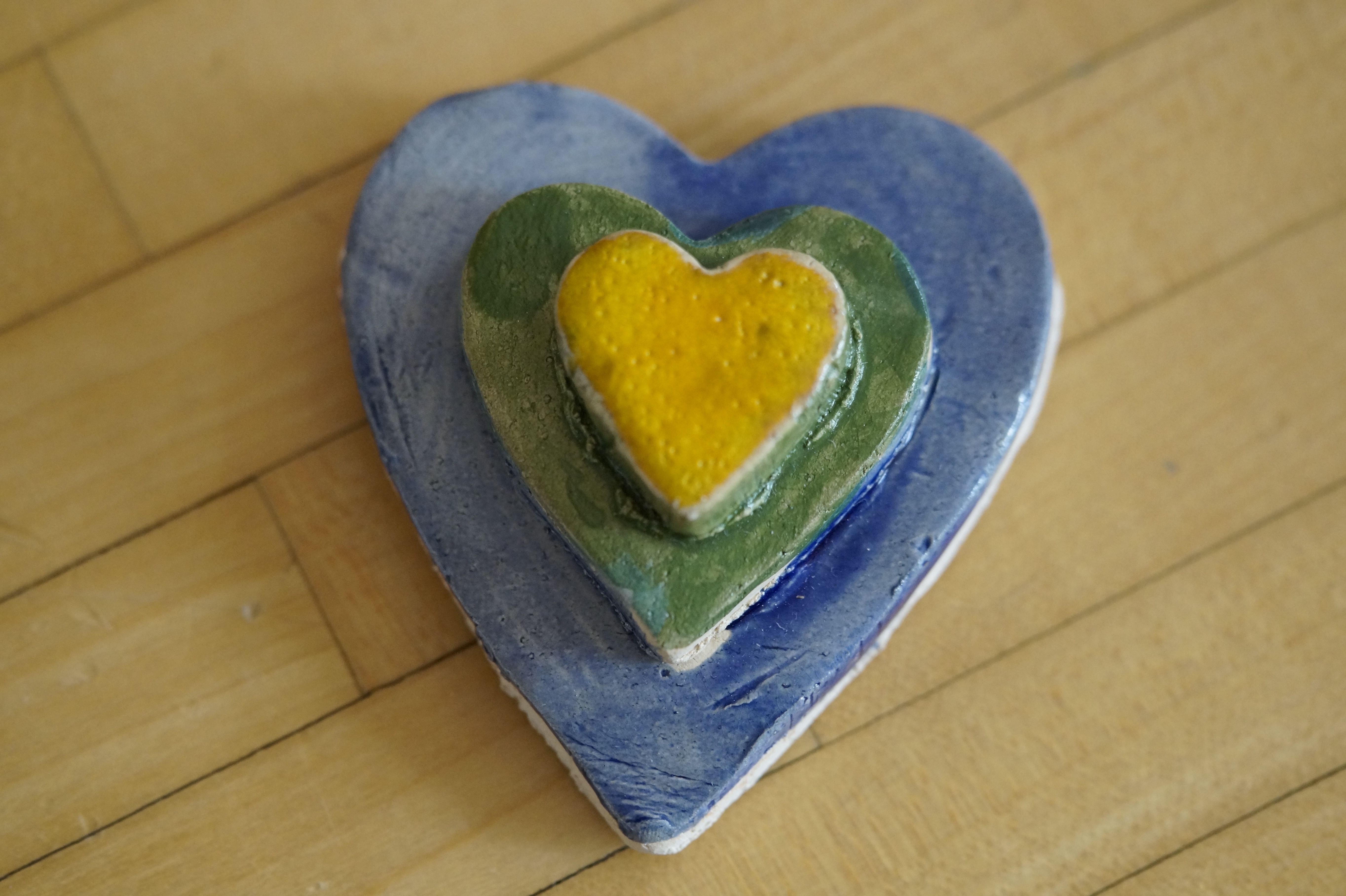 blue green and yellow heart ceramic ornament