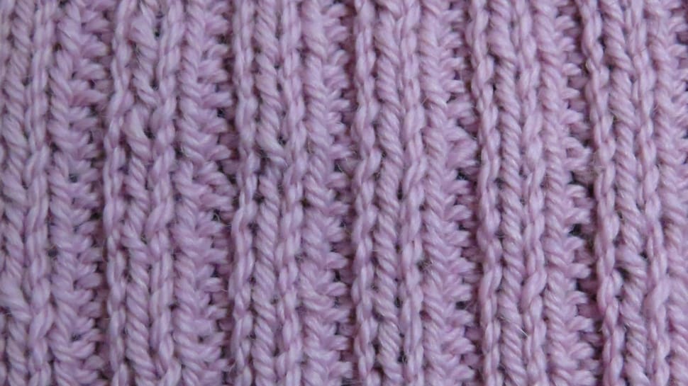 purple knitted textile preview