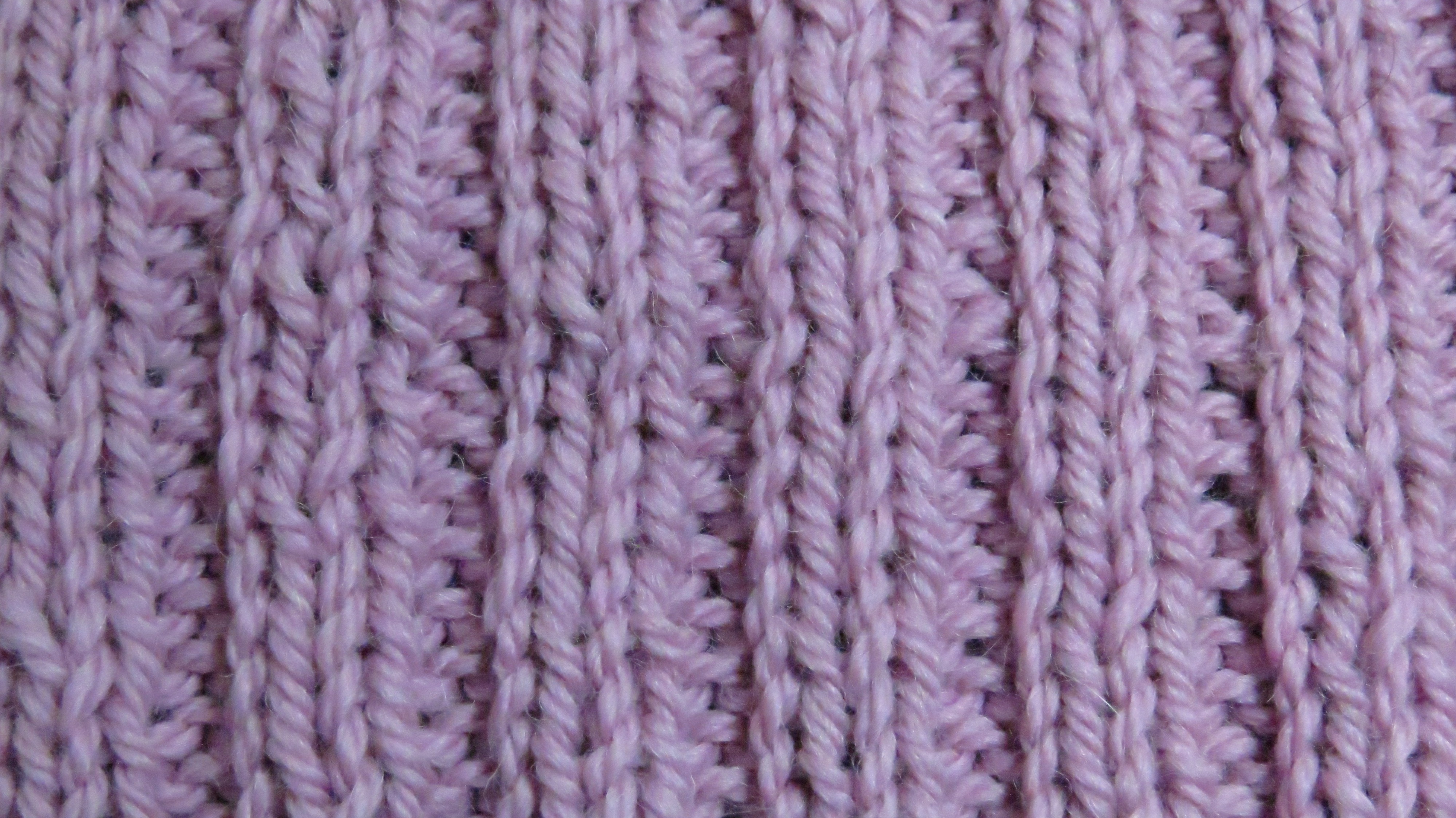 purple knitted textile
