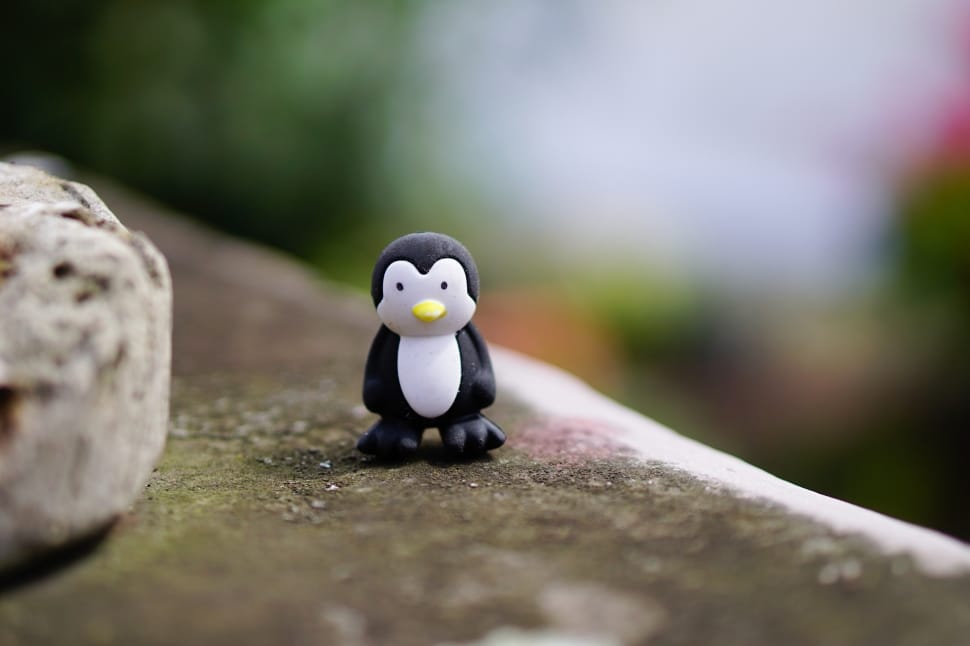 white and black penguin toy preview