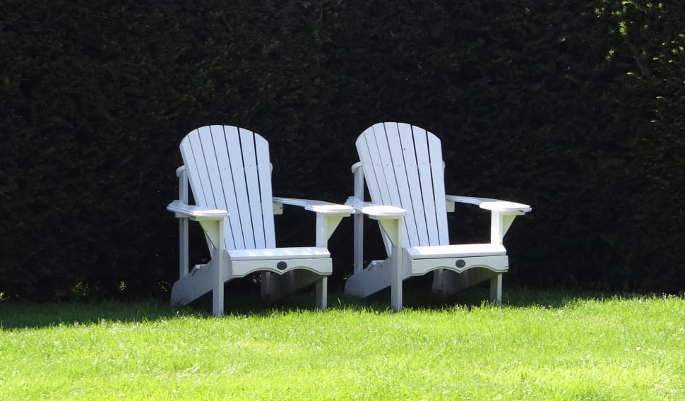 2 white wooden lounge chairs preview