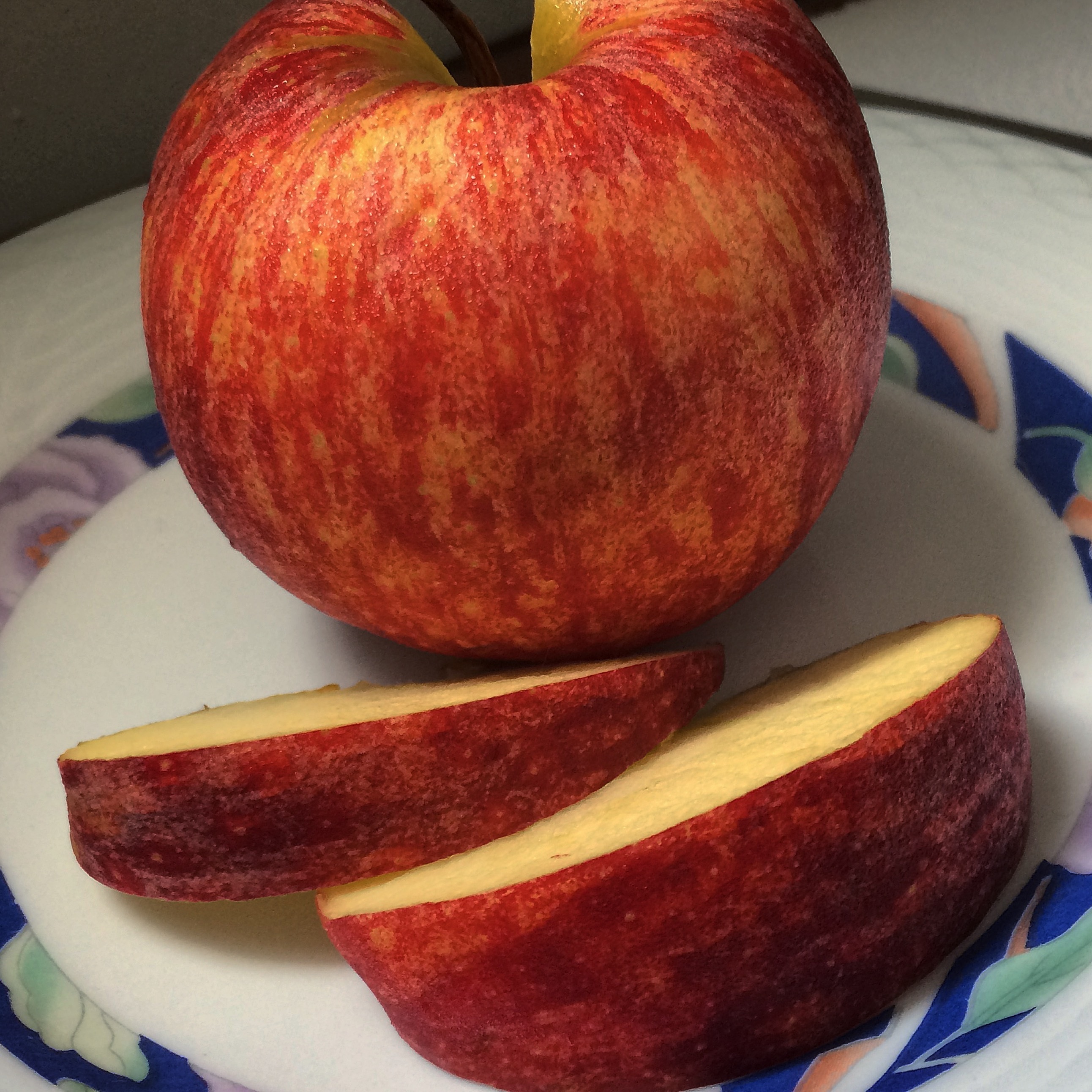 red sliced apple fruit
