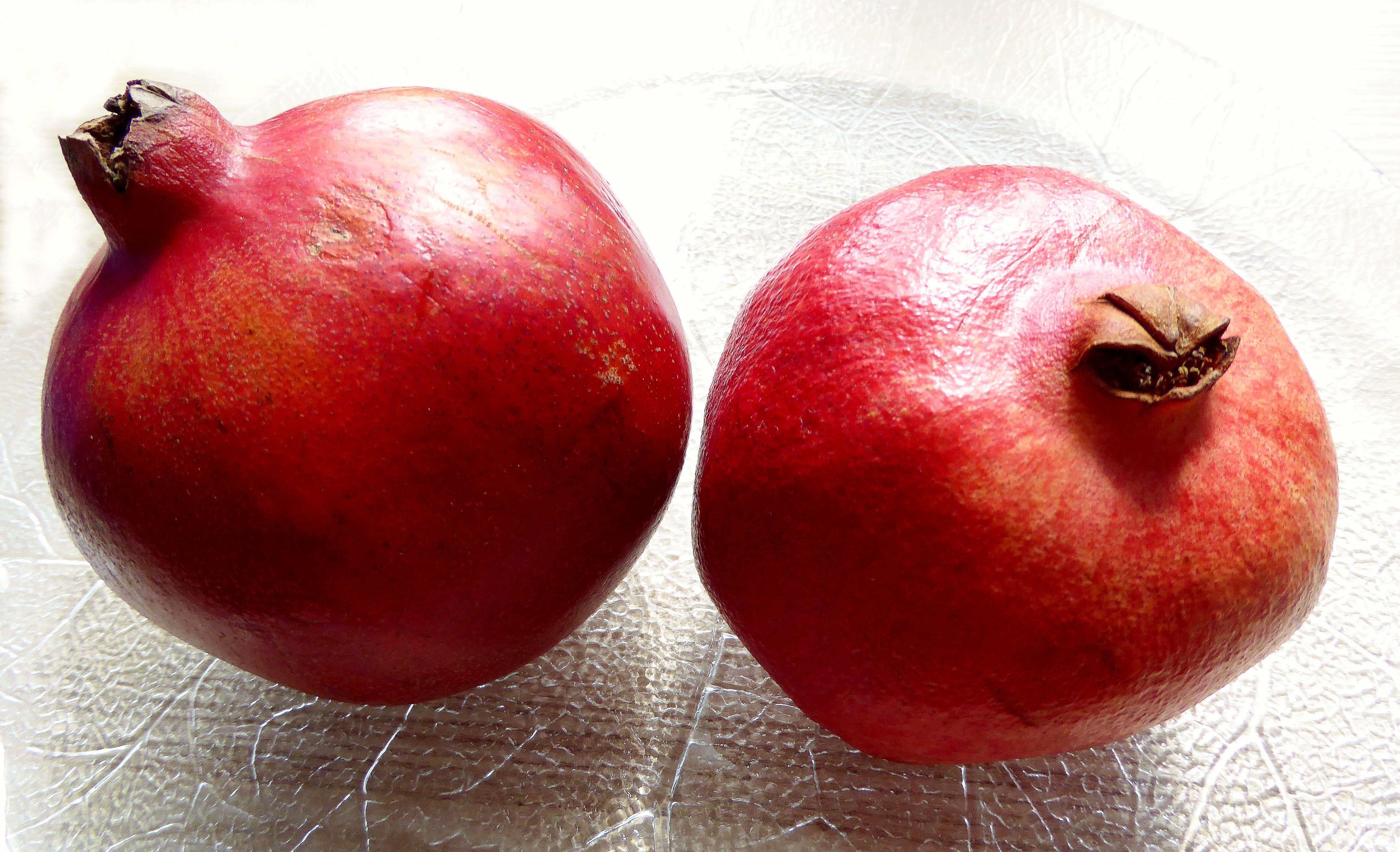 2 red pomegranates