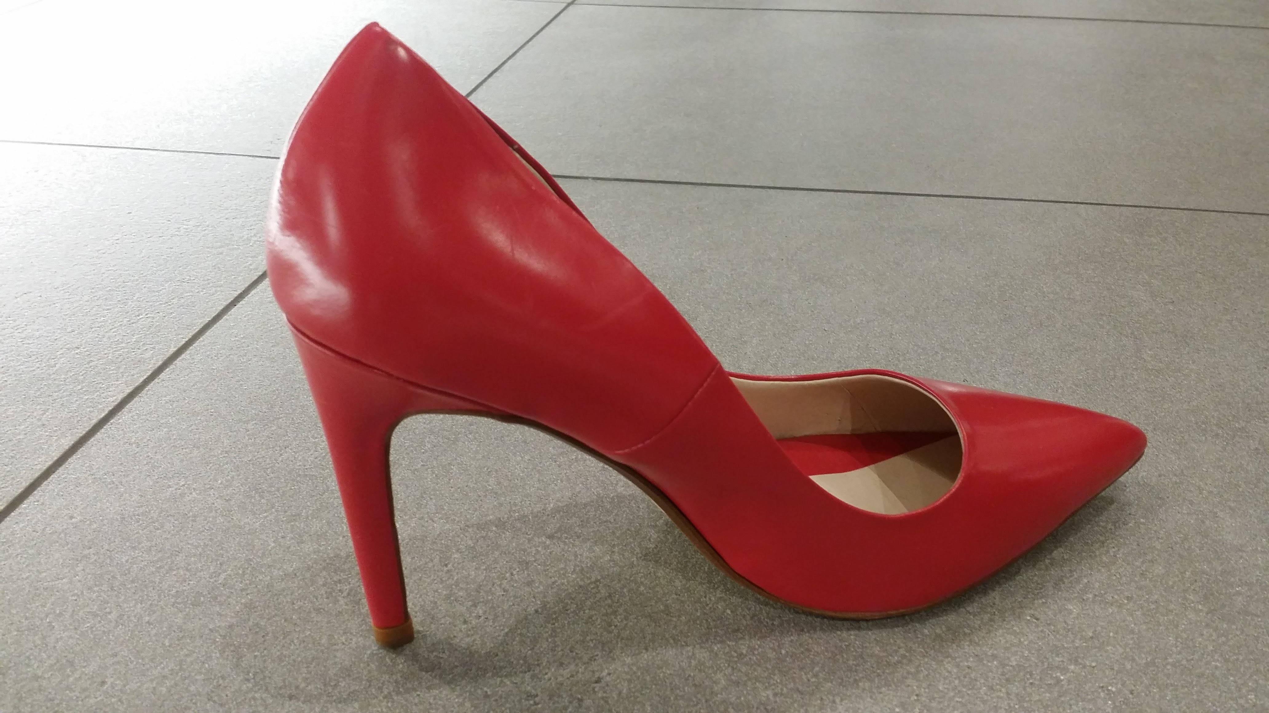 red leather pointed toe pumps