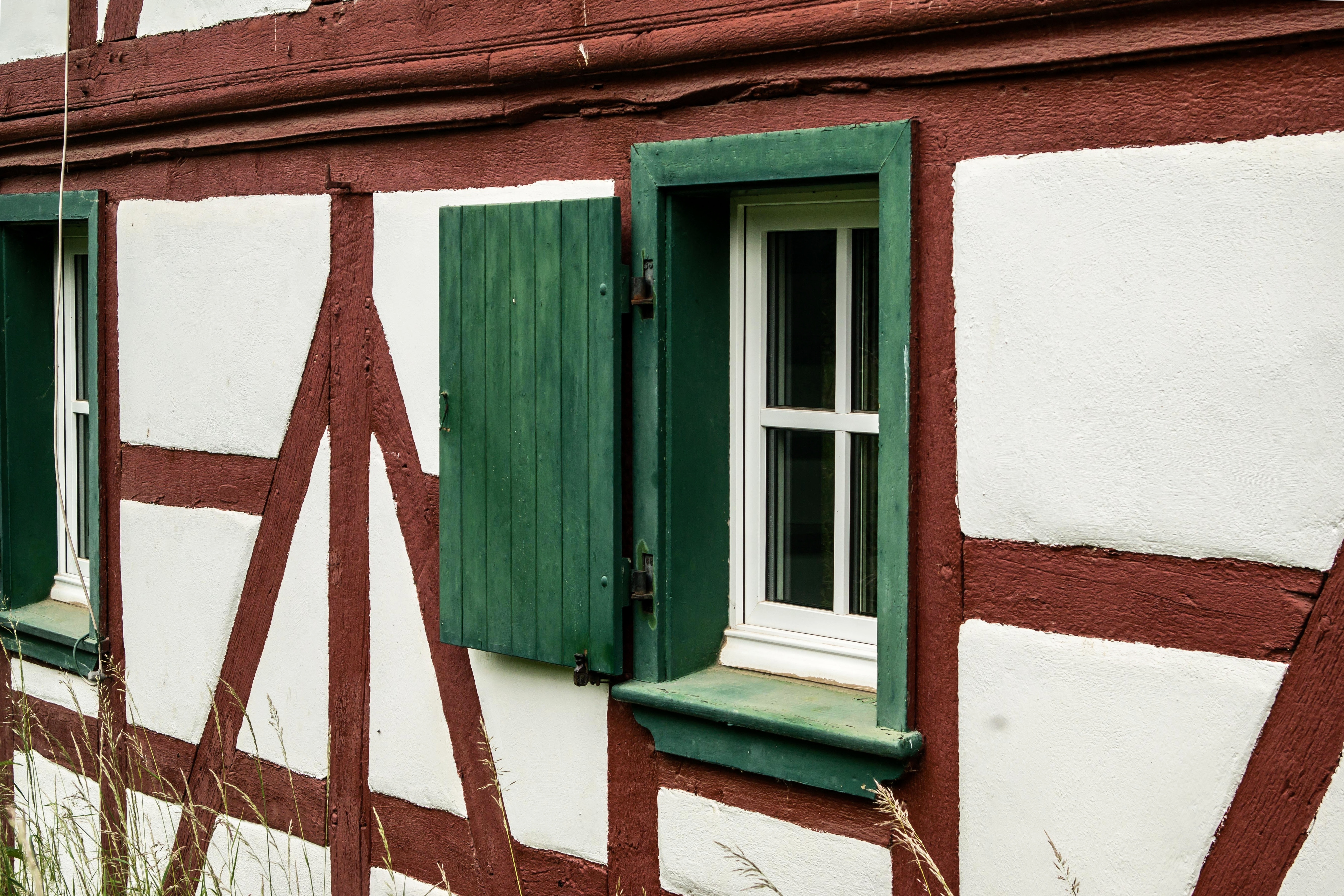 green wooden frame window