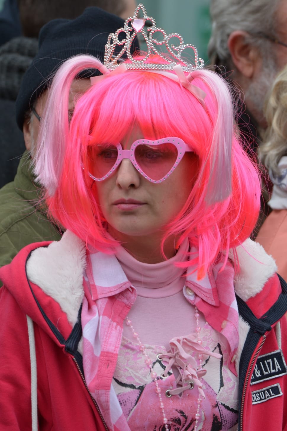 person in pink wig with tiara preview