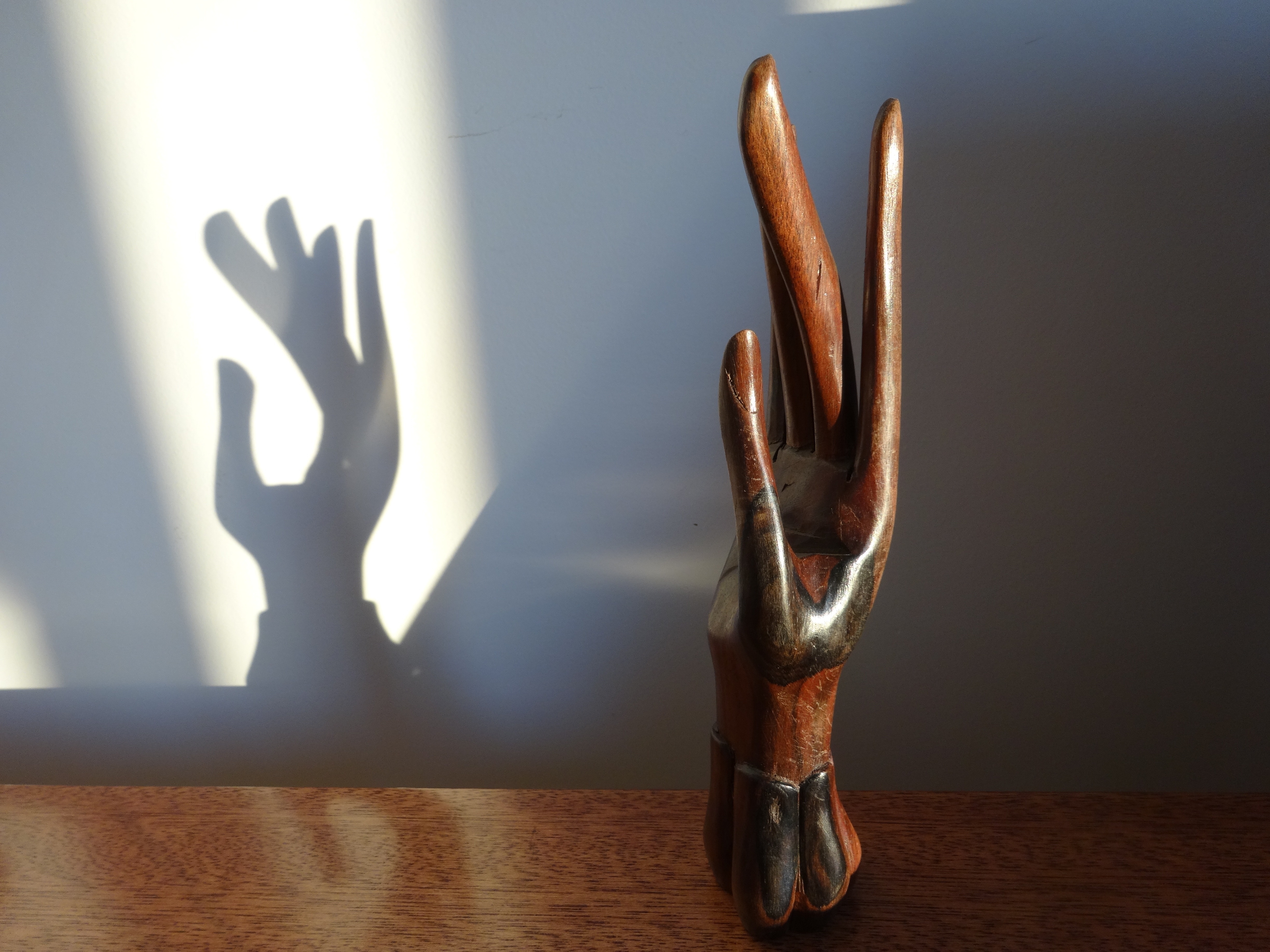 brown wooden hand table decor