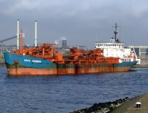 orange and blue cargo ship thumbnail