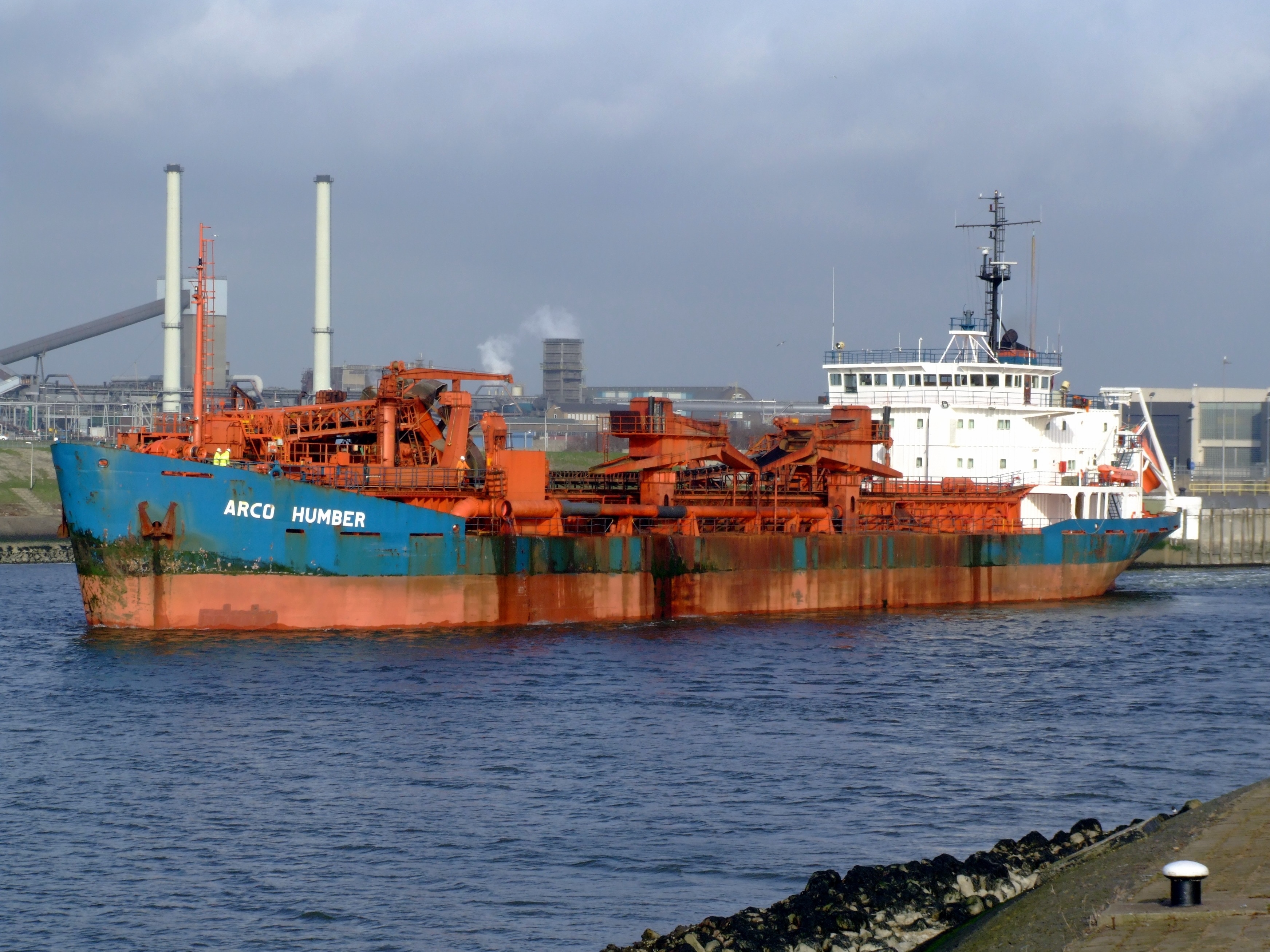 orange and blue cargo ship