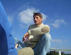 men's gray cashmere sweater and blue jeans thumbnail