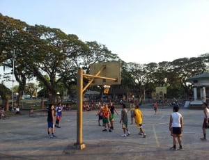 yellow and white outdoor basketball hoop thumbnail