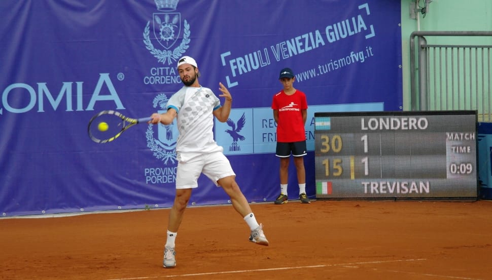 tennis player in white shirt standing preview