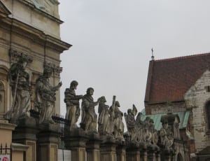 group of people standing statues thumbnail