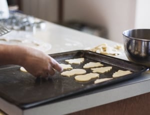 person baking cookie thumbnail