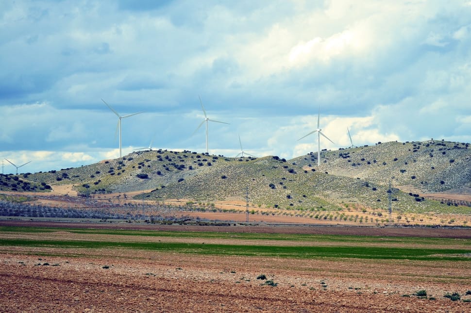 photography of windmills on mountain preview