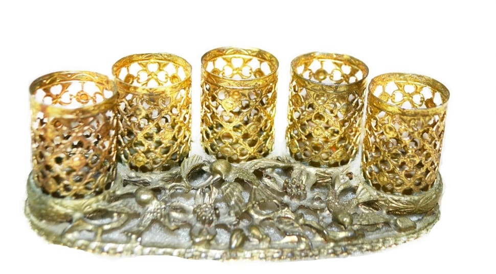 five brass candle holders preview