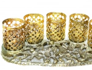five brass candle holders thumbnail