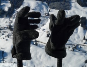 2 black snow gloves thumbnail