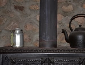 black cooking furnace,teapot and steel mug thumbnail