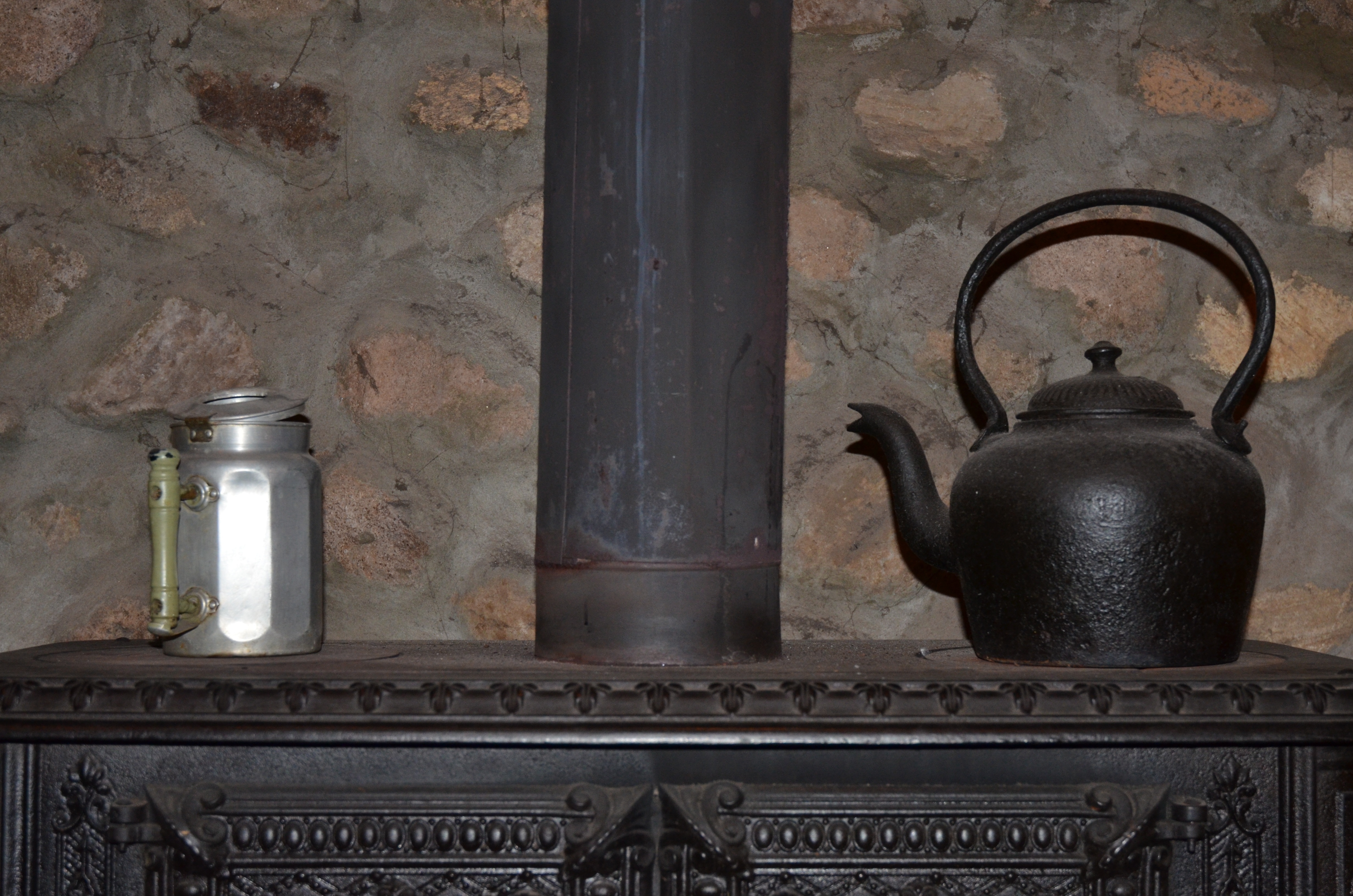 black cooking furnace,teapot and steel mug