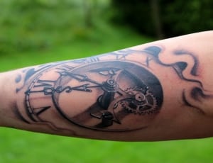 black clock tattoo thumbnail