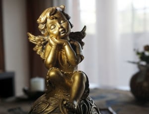 brass angel figurine thumbnail