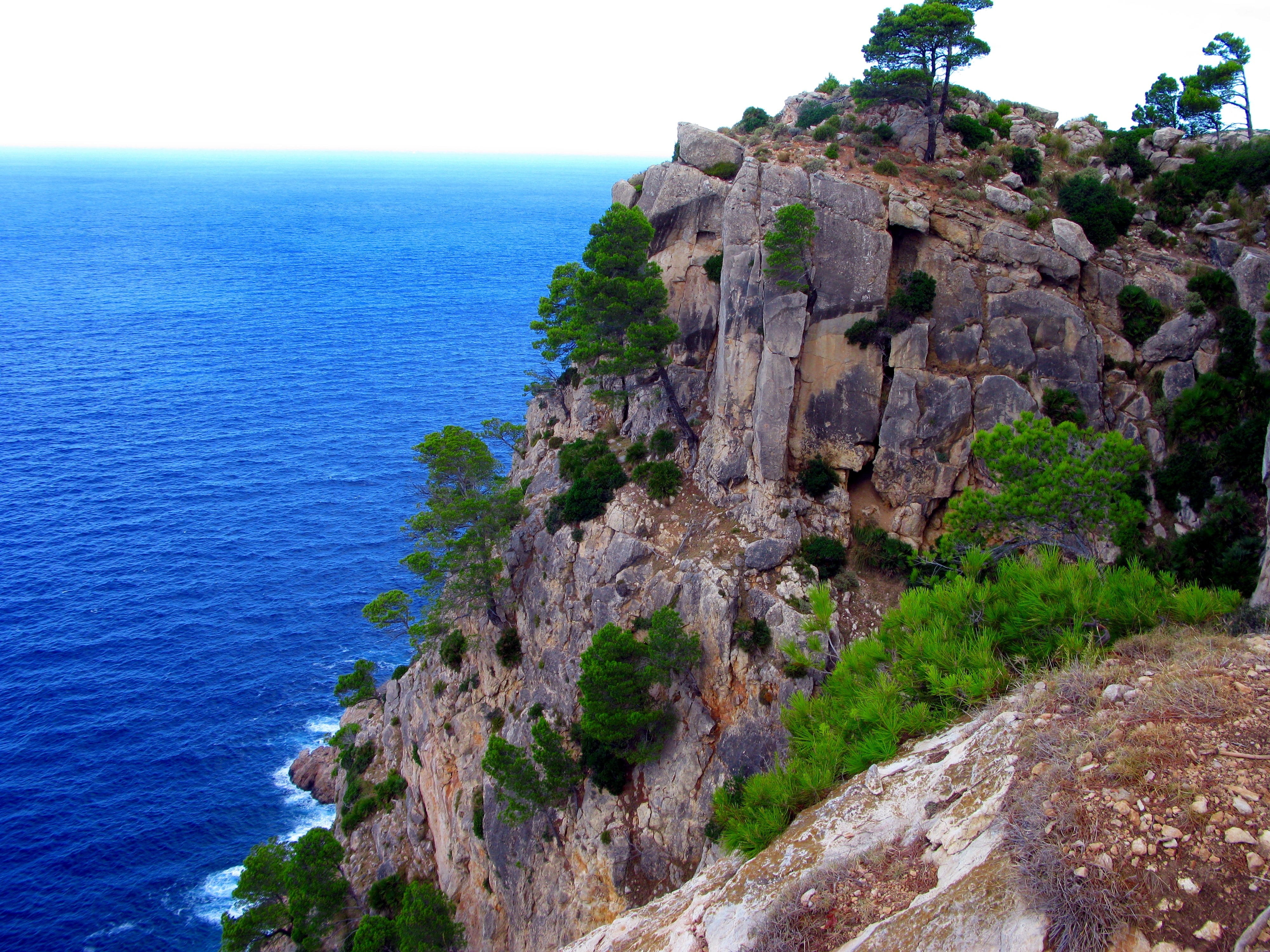 brown cliffs near sea