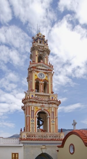 white and brown concrete clock tower thumbnail