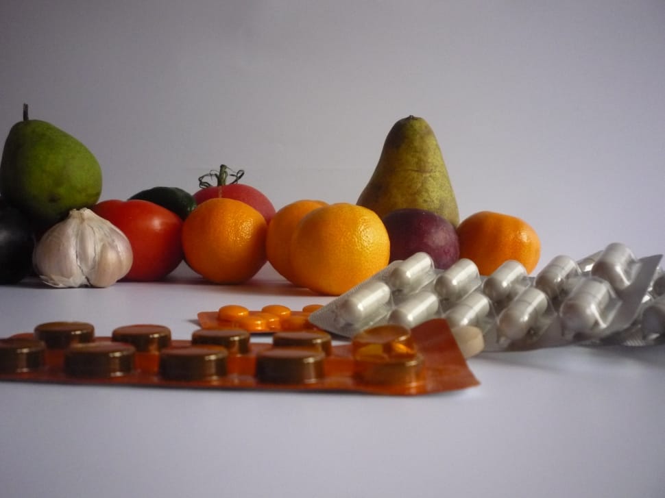 assorted fruit and medical pill pack preview