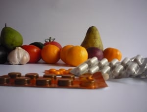 assorted fruit and medical pill pack thumbnail