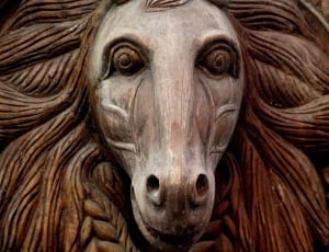 brown wooden horse head figurine thumbnail