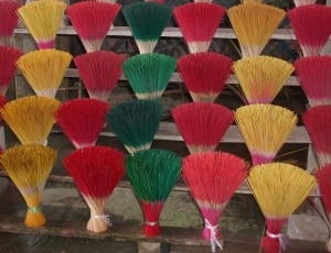 assorted colored of broom stick decors thumbnail