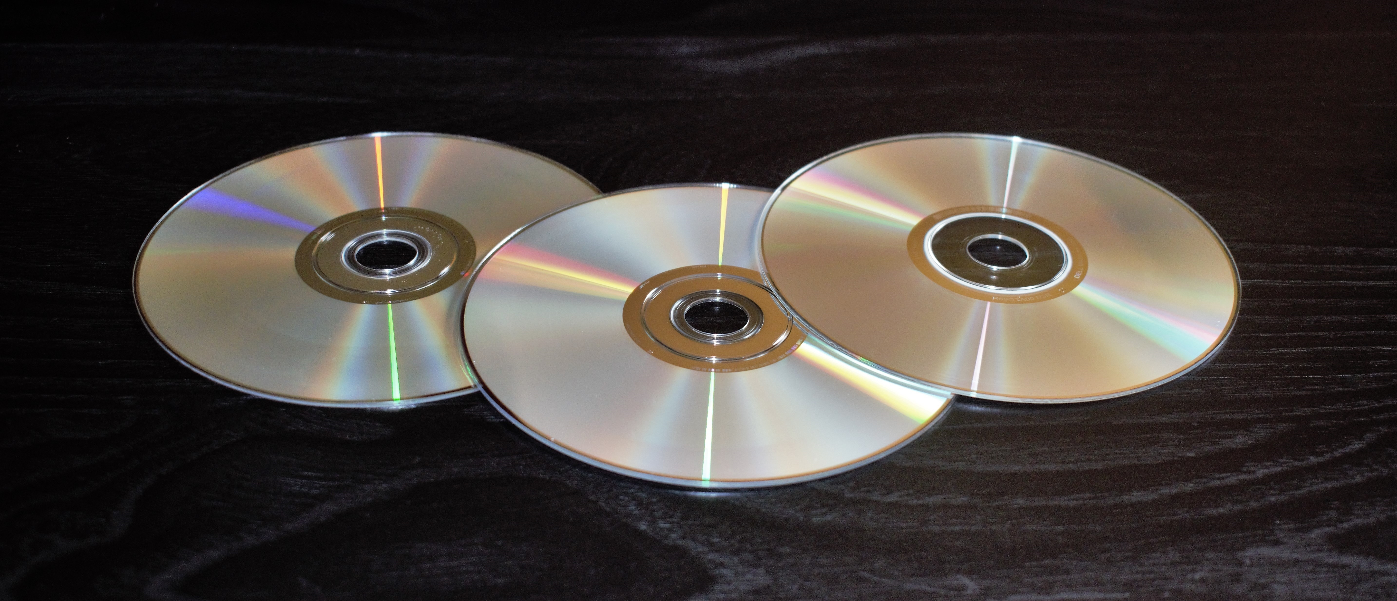 three compact discs