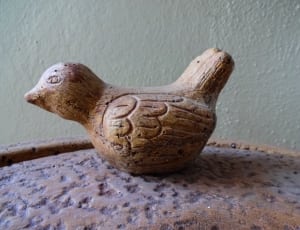 brown bird figurine thumbnail