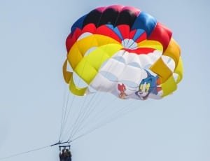 red black blue and white tom and jerry parachute thumbnail