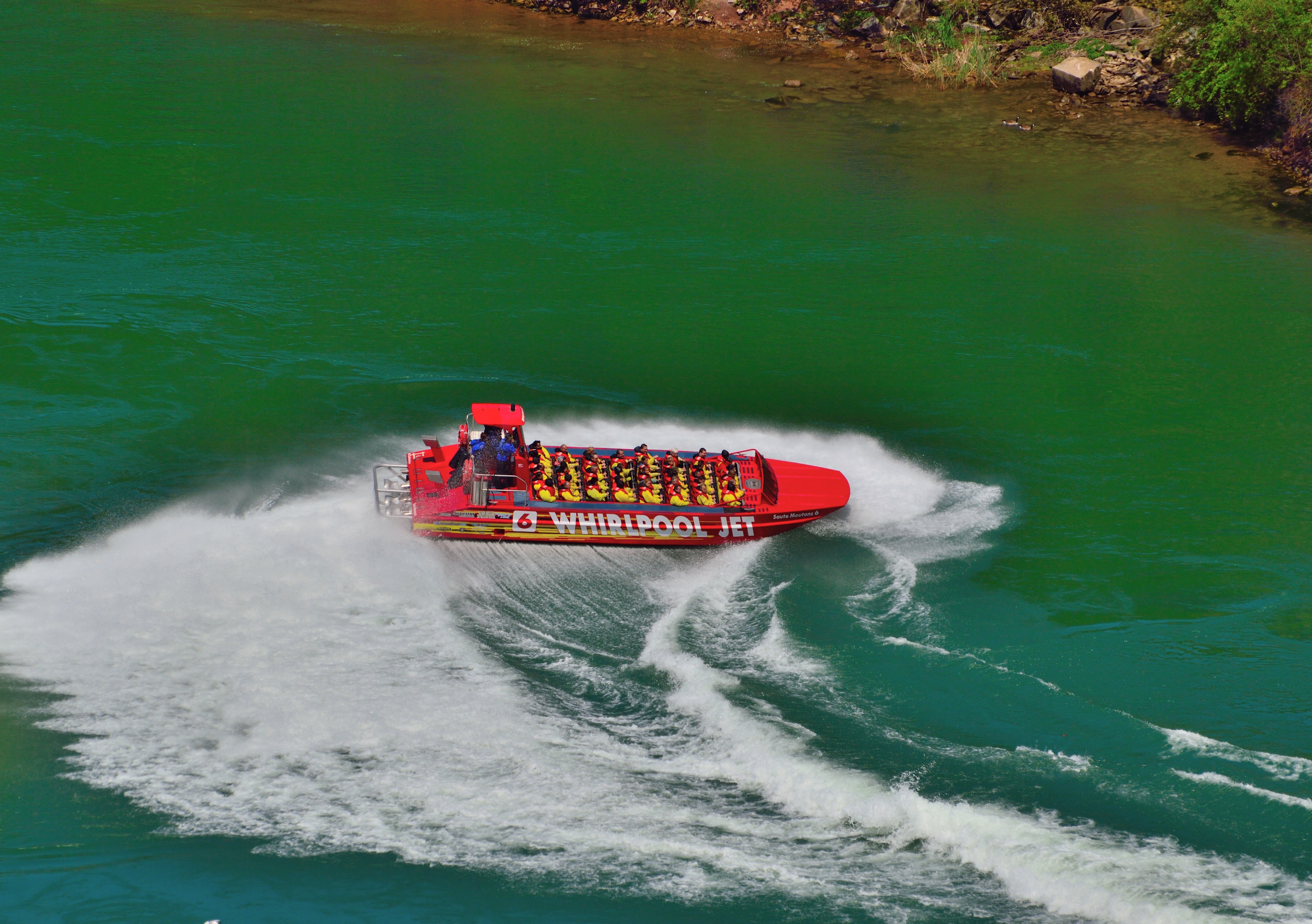 red and yellow whirlpool jet