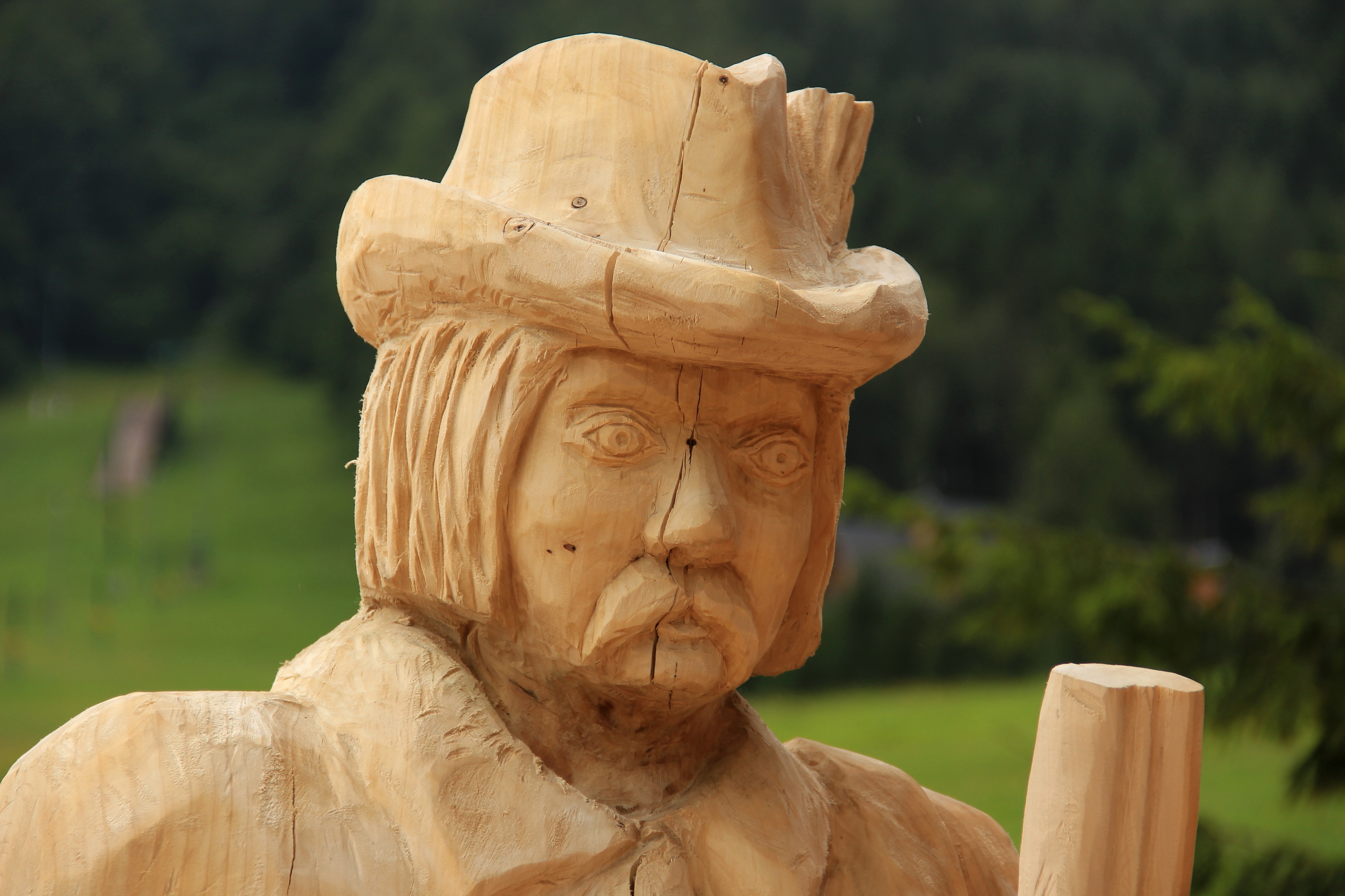 wooden man statue