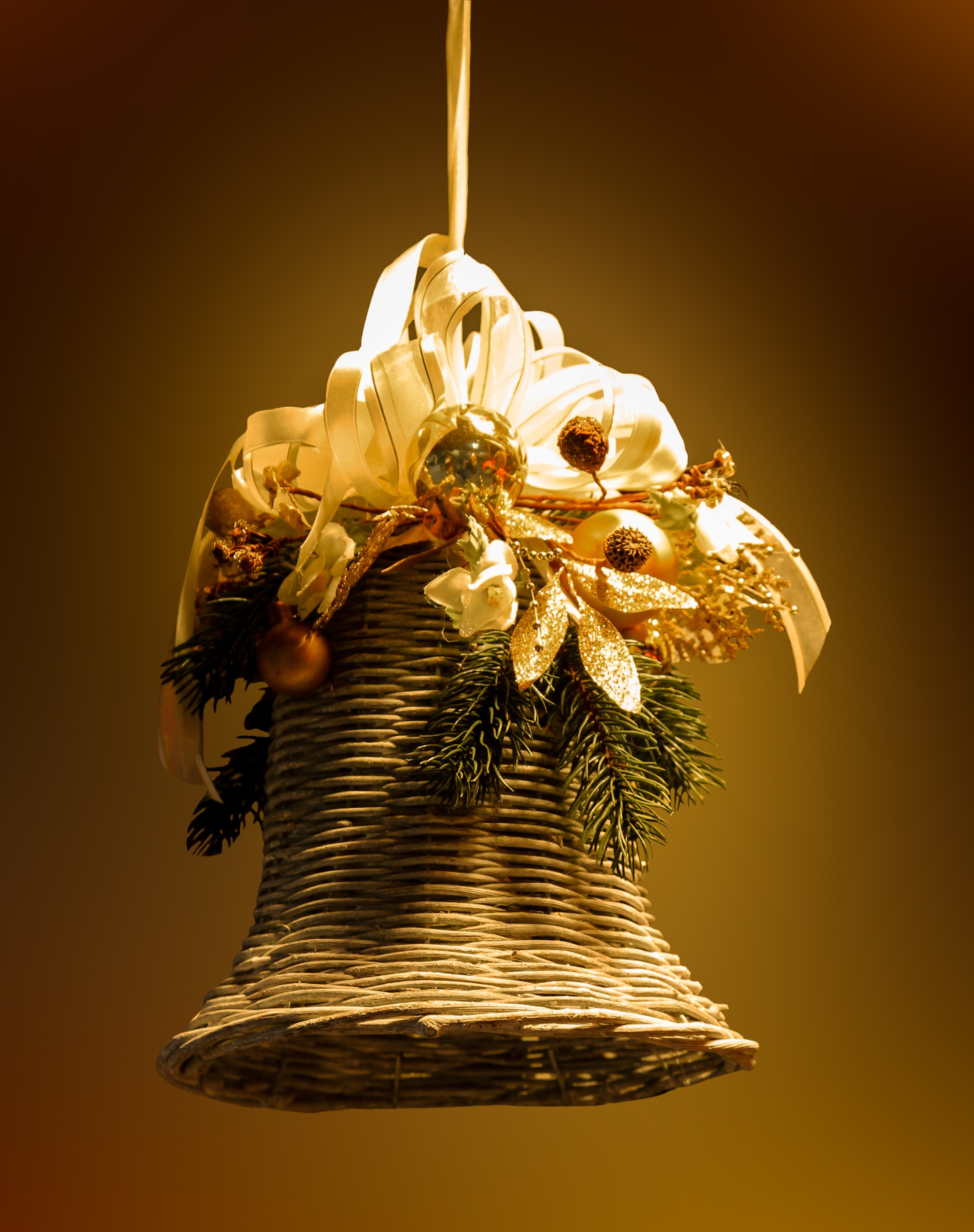 brown and gold wicker bell hanging decor