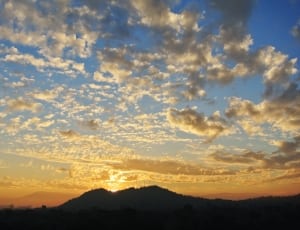 silhouette of mountain during sunset thumbnail