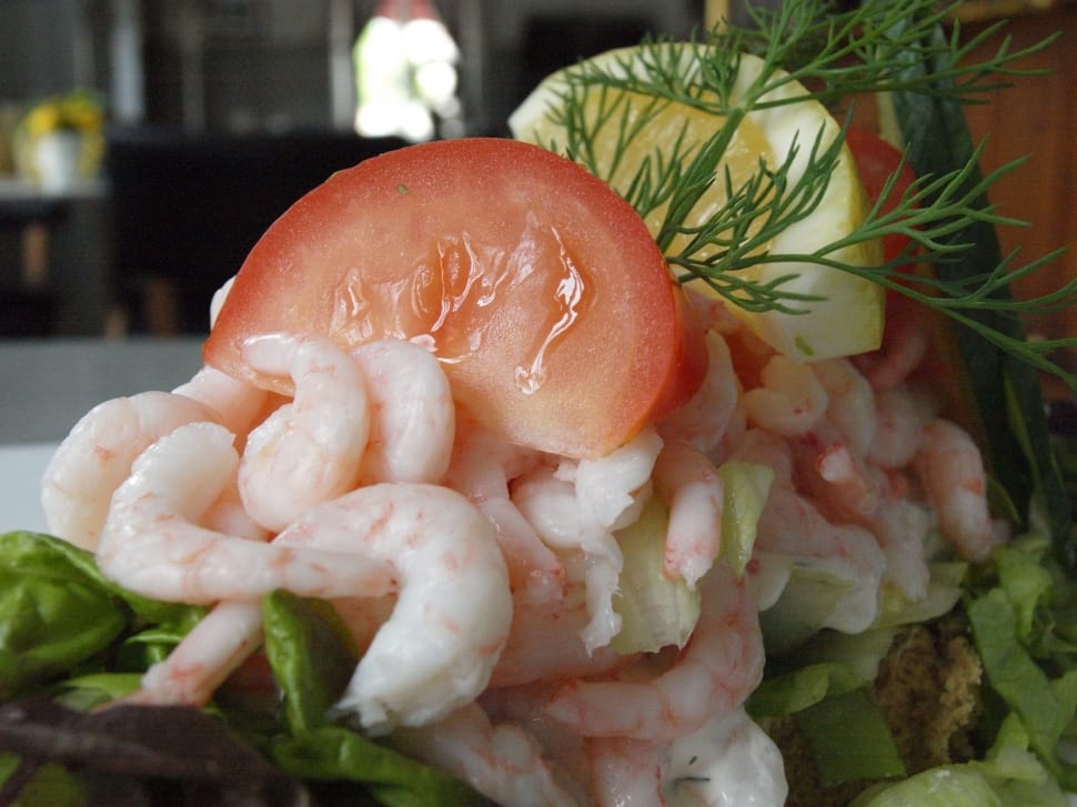 raw shrimp sliced tomato and sliced lemon preview