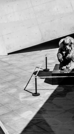 sculpture of man grayscale photo thumbnail