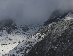 white and black mountain covered in snow thumbnail
